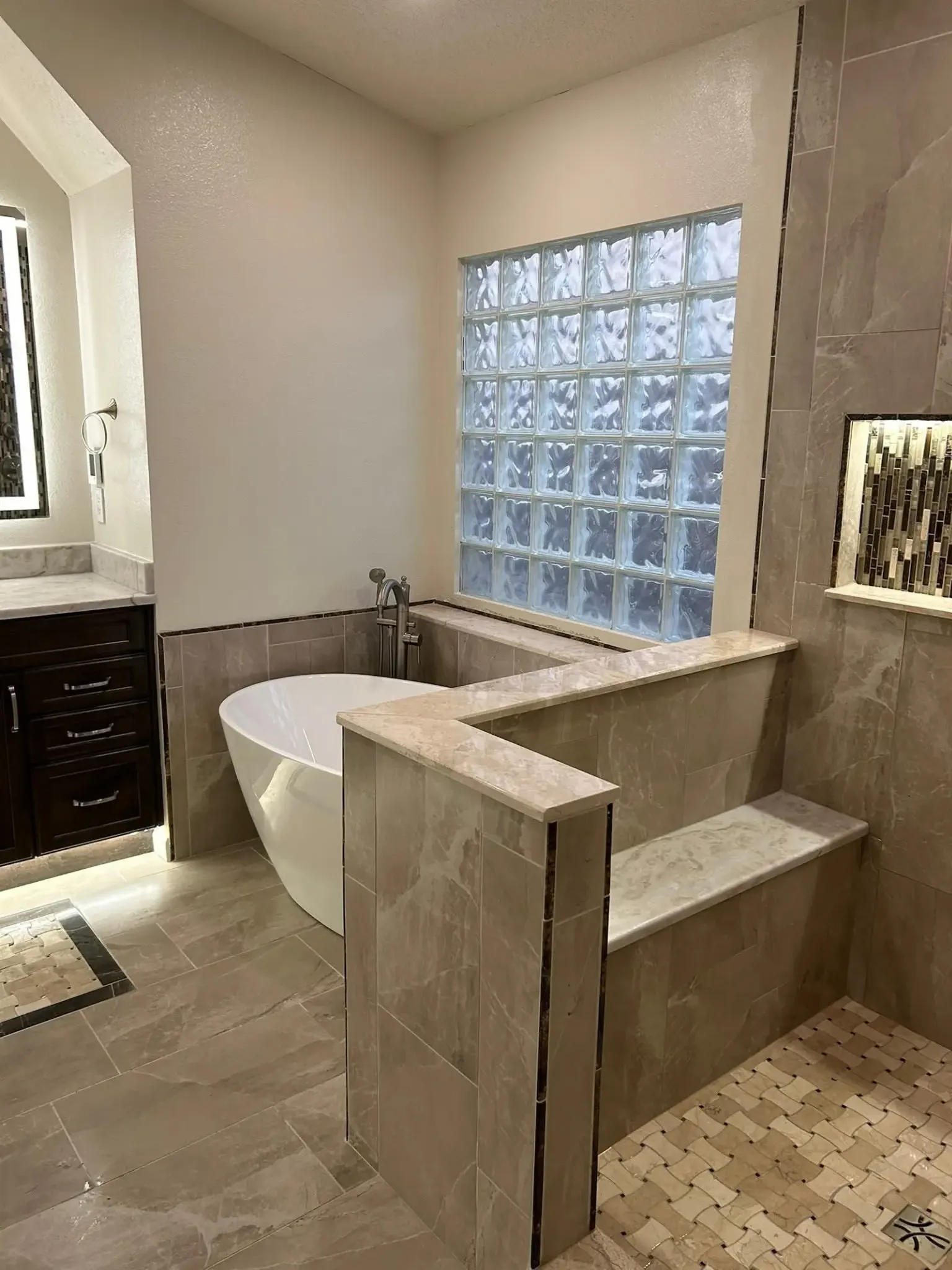 Bathroom surface updates with tile, bathtub, and vanity in Sarasota