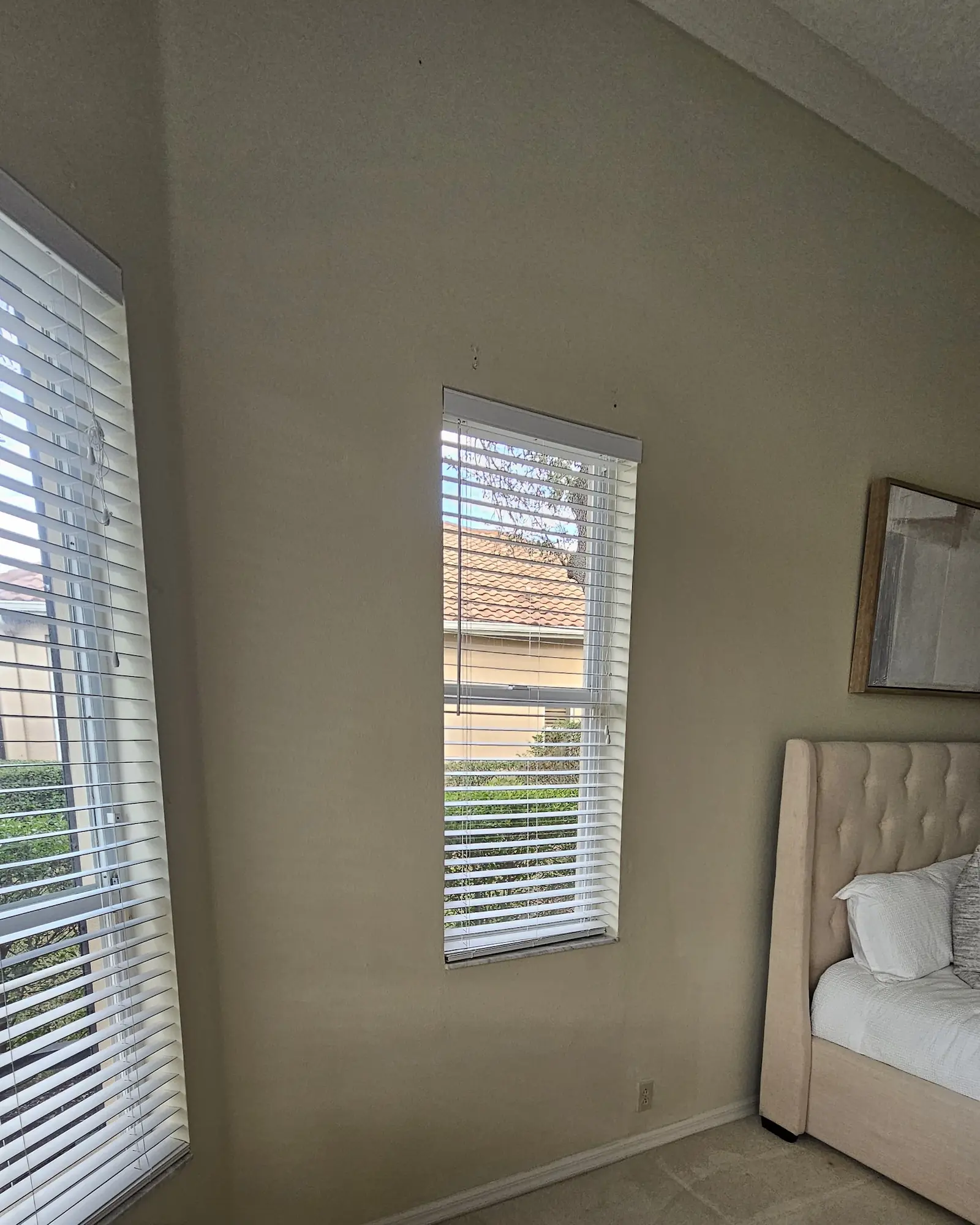 Completed interior window repair with finished drywall and trim.