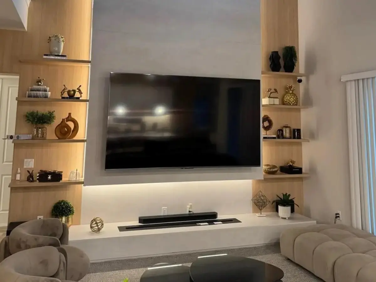 Completed TV mounting installation in a Sarasota, Florida living room.